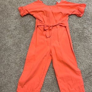 Size 4 peebay coral elbow length ruffled sleeve jumper w/zipper. Never worn.